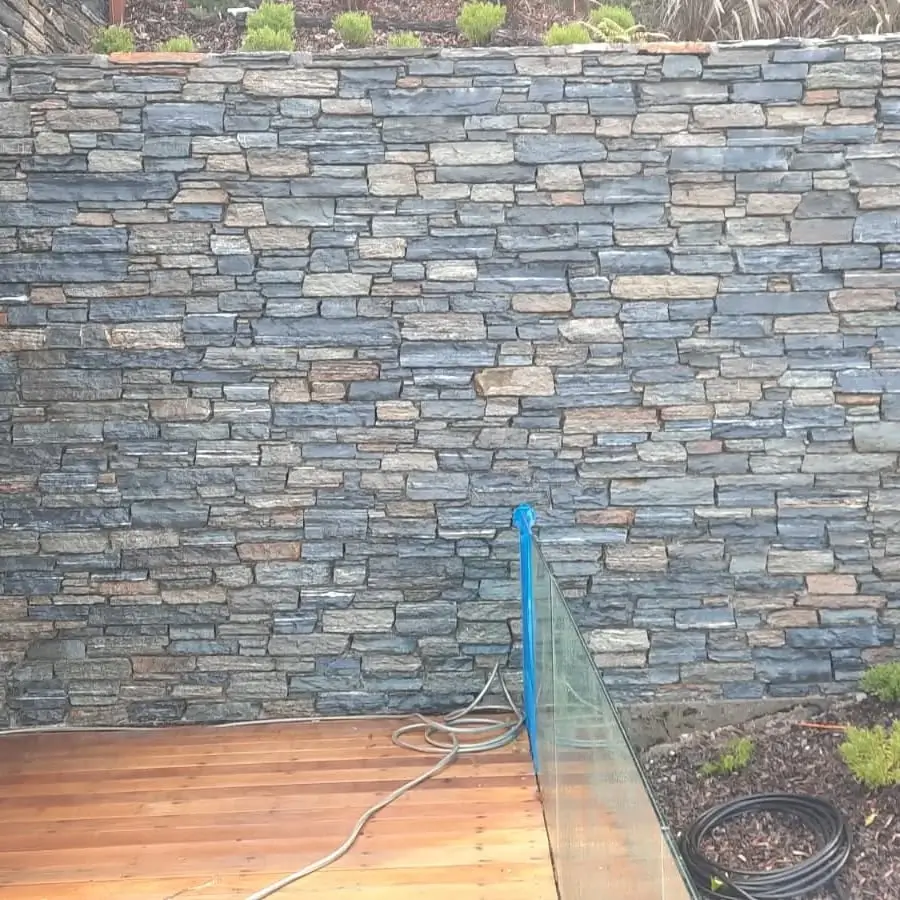 Restored concrete wall after complete efflorescence removal in Queenstown